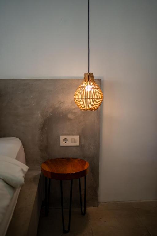 Postel nebo postele na pokoji v ubytování Suku Lifestyle Hotel & Villas