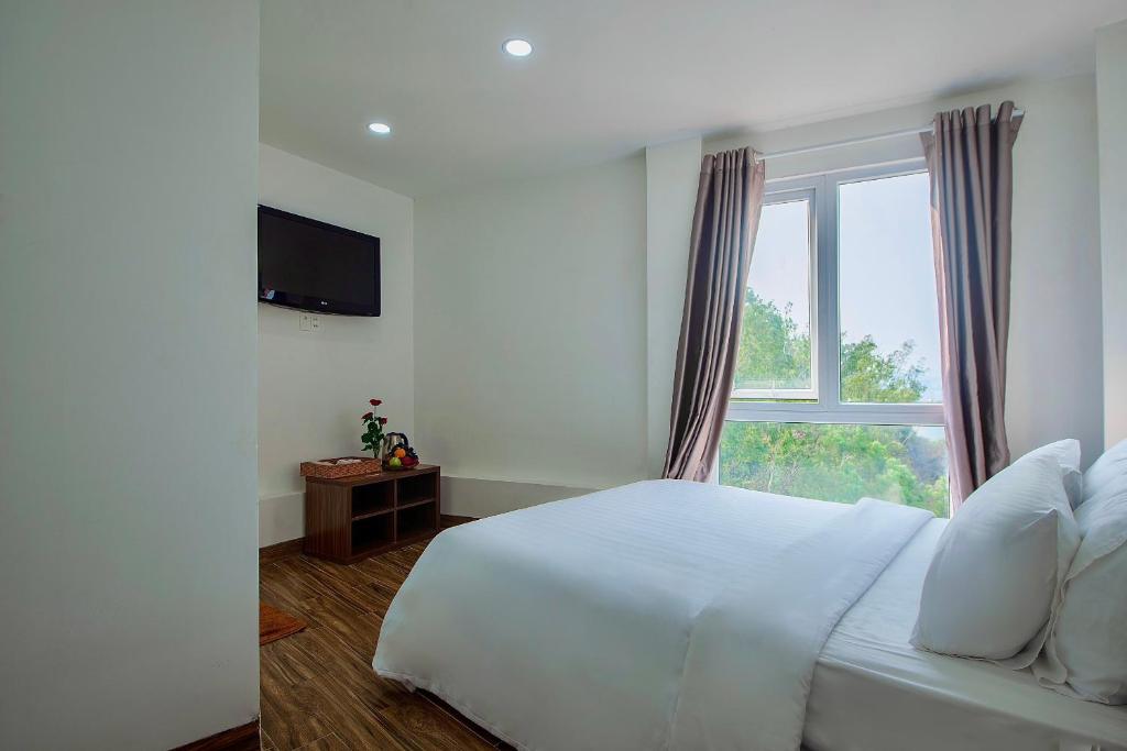 TV a/nebo společenská místnost v ubytování Khách sạn CLIFFHOUSE NHA TRANG