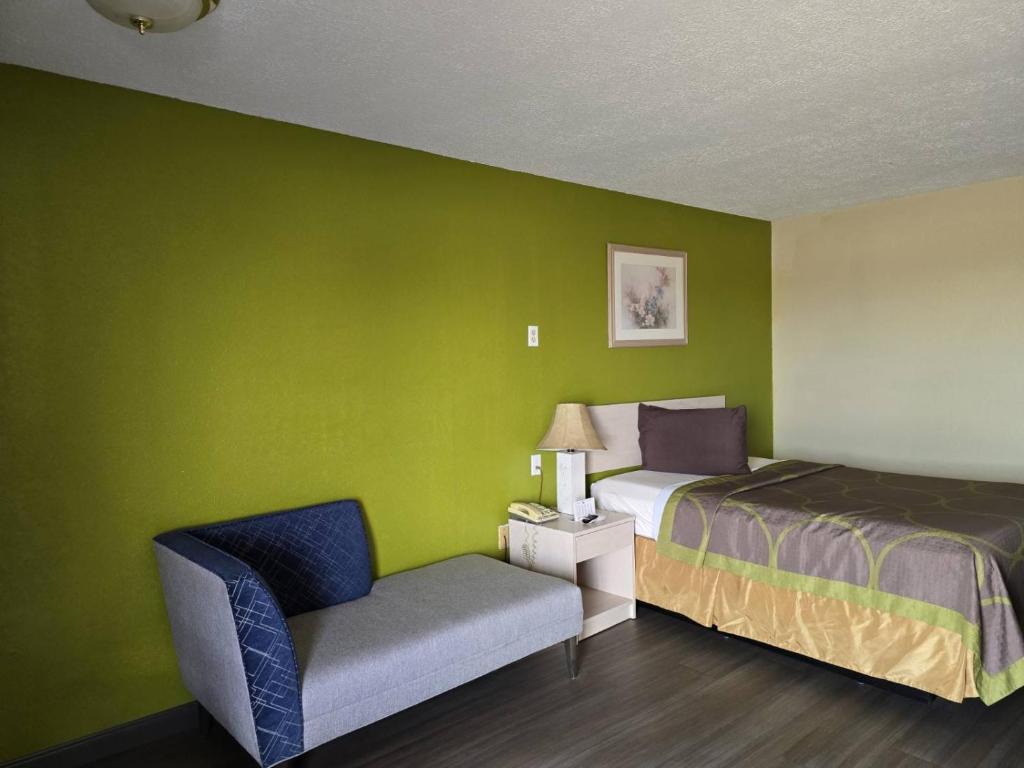 Krevet ili kreveti u jedinici u objektu Lodge USA Motel