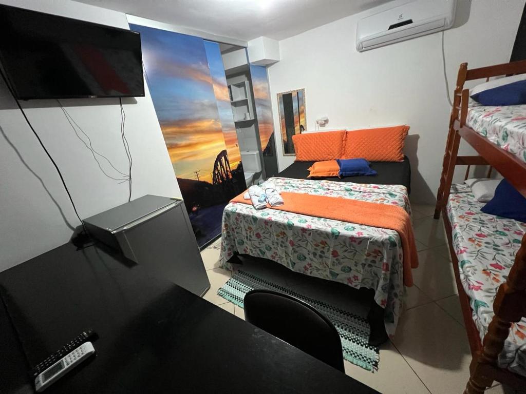 Postel nebo postele na pokoji v ubytování POUSADA DO HOSTEL
