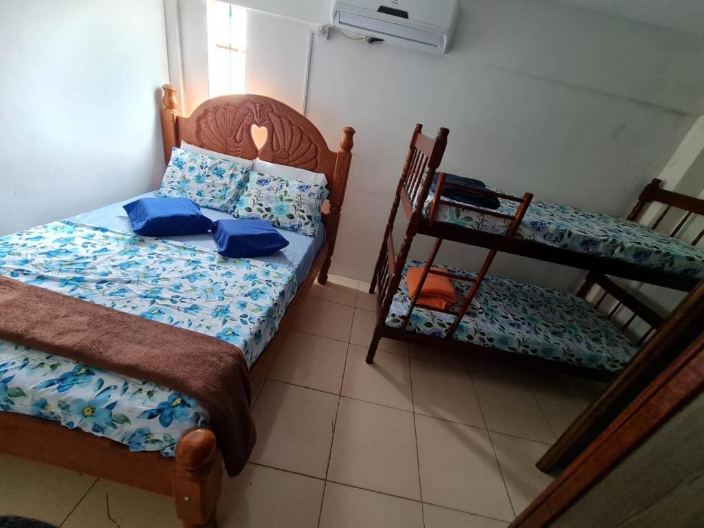Postel nebo postele na pokoji v ubytování POUSADA DO HOSTEL