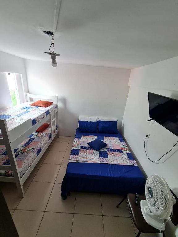 Postel nebo postele na pokoji v ubytování POUSADA DO HOSTEL