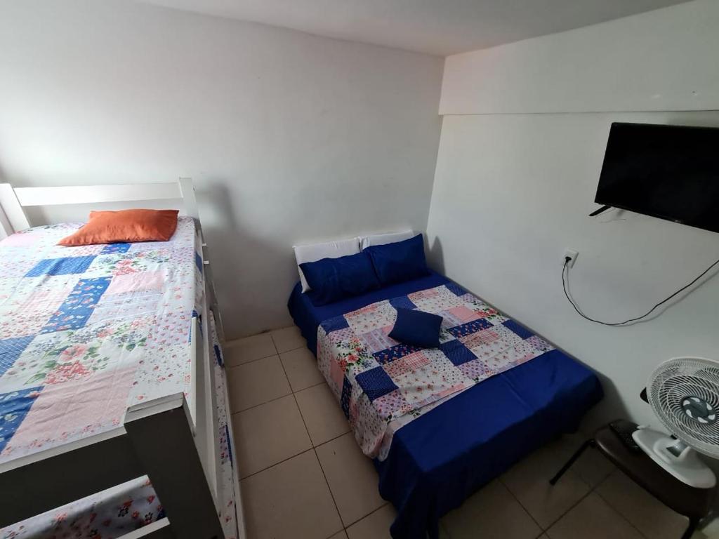 Postel nebo postele na pokoji v ubytování POUSADA DO HOSTEL