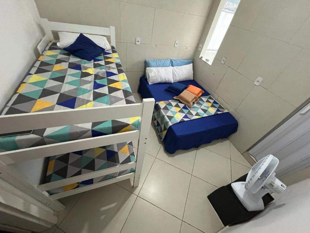 Postel nebo postele na pokoji v ubytování POUSADA DO HOSTEL