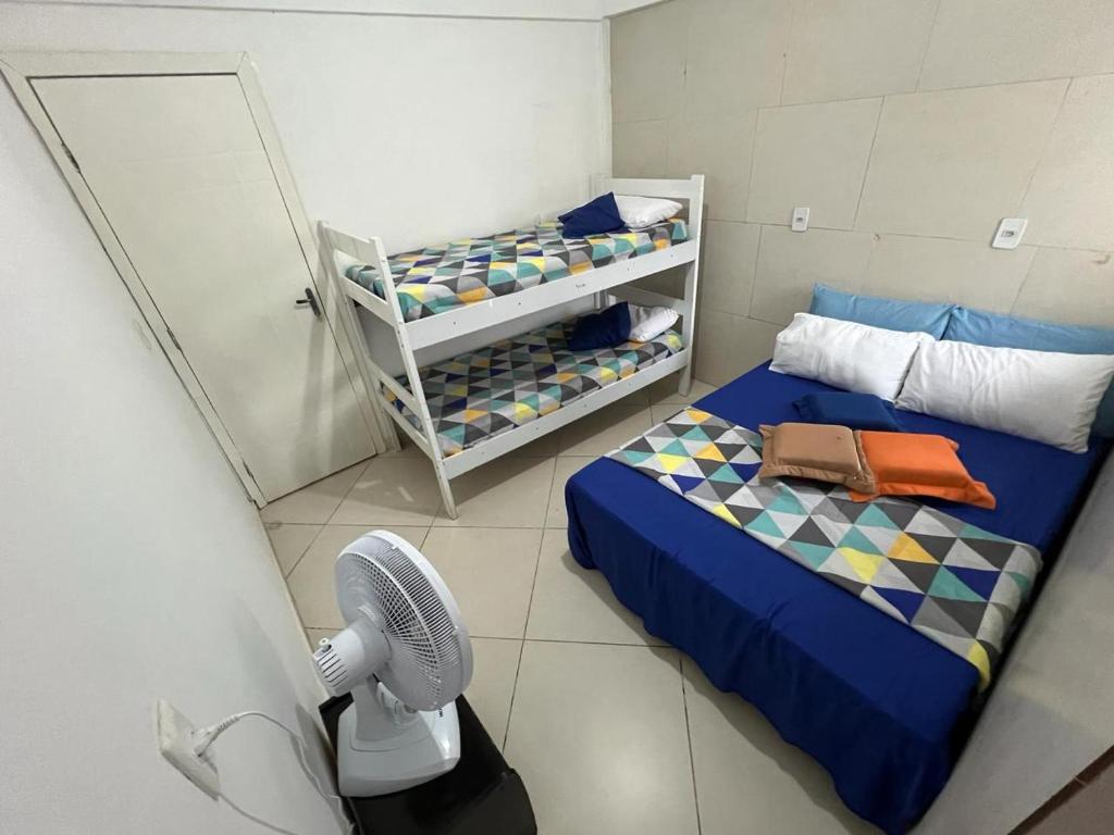 Postel nebo postele na pokoji v ubytování POUSADA DO HOSTEL