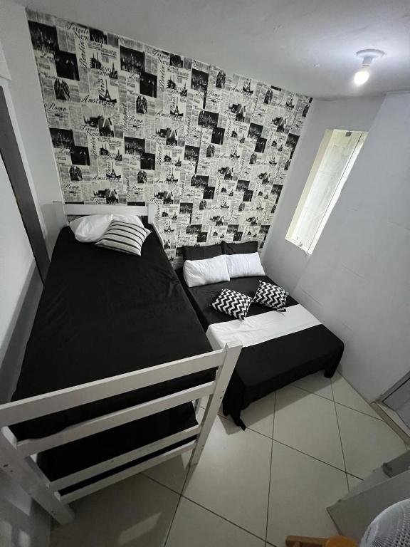 Postel nebo postele na pokoji v ubytování POUSADA DO HOSTEL