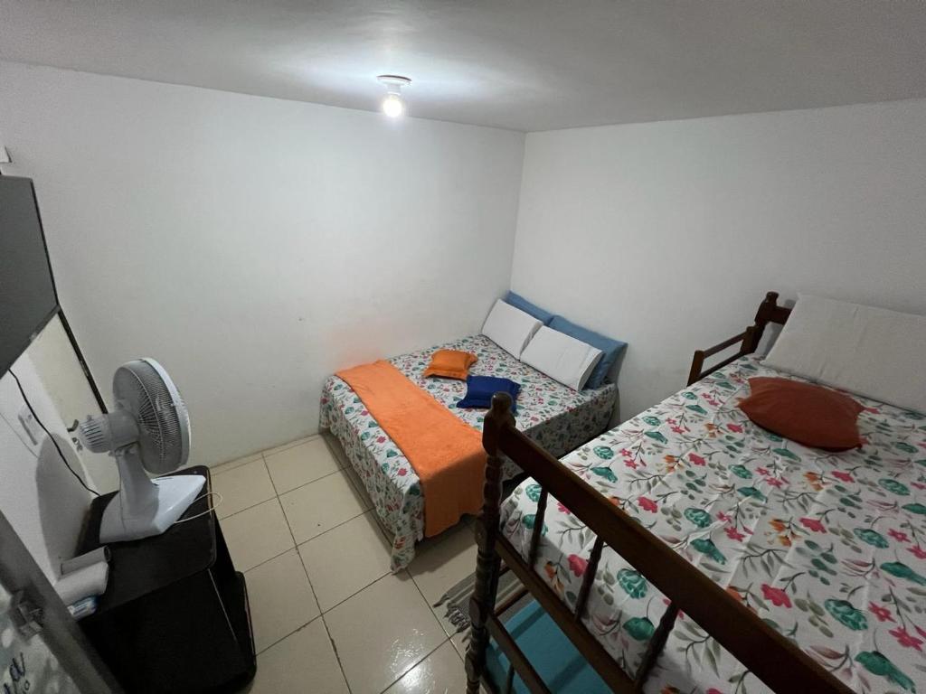 Postel nebo postele na pokoji v ubytování POUSADA DO HOSTEL