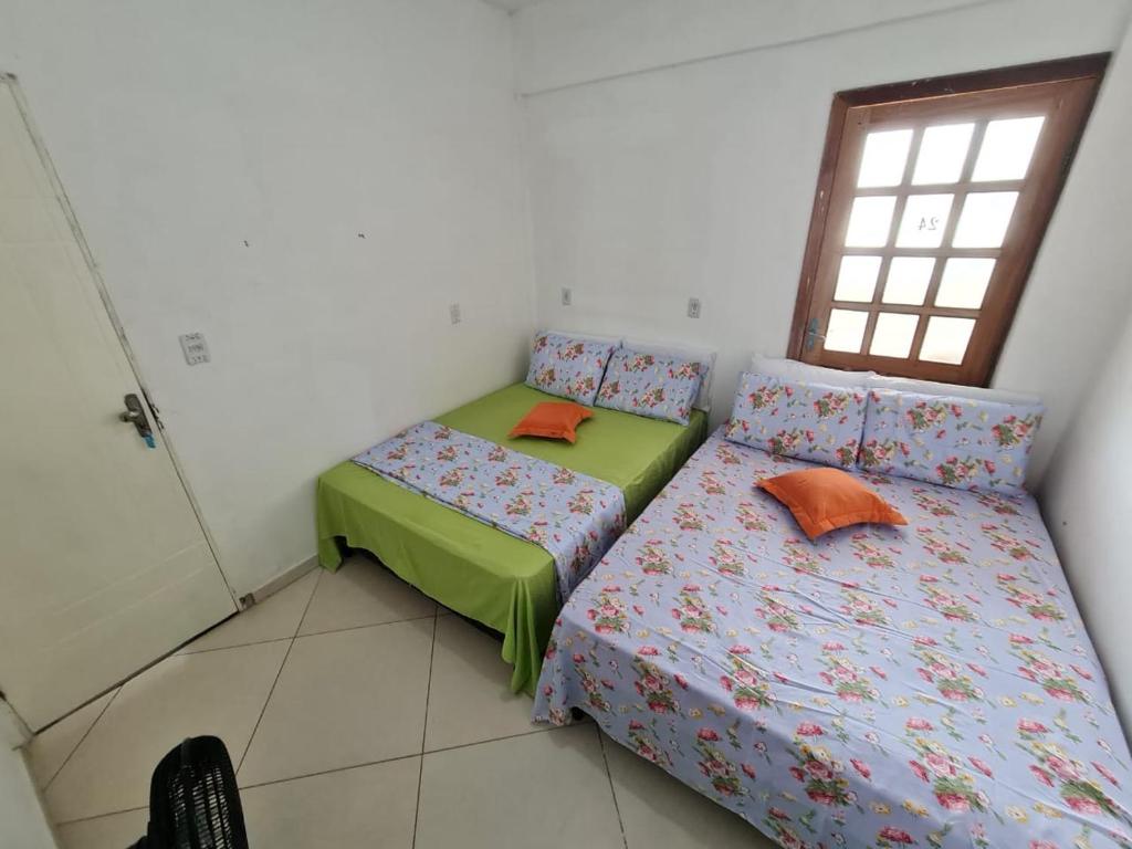 Postel nebo postele na pokoji v ubytování POUSADA DO HOSTEL