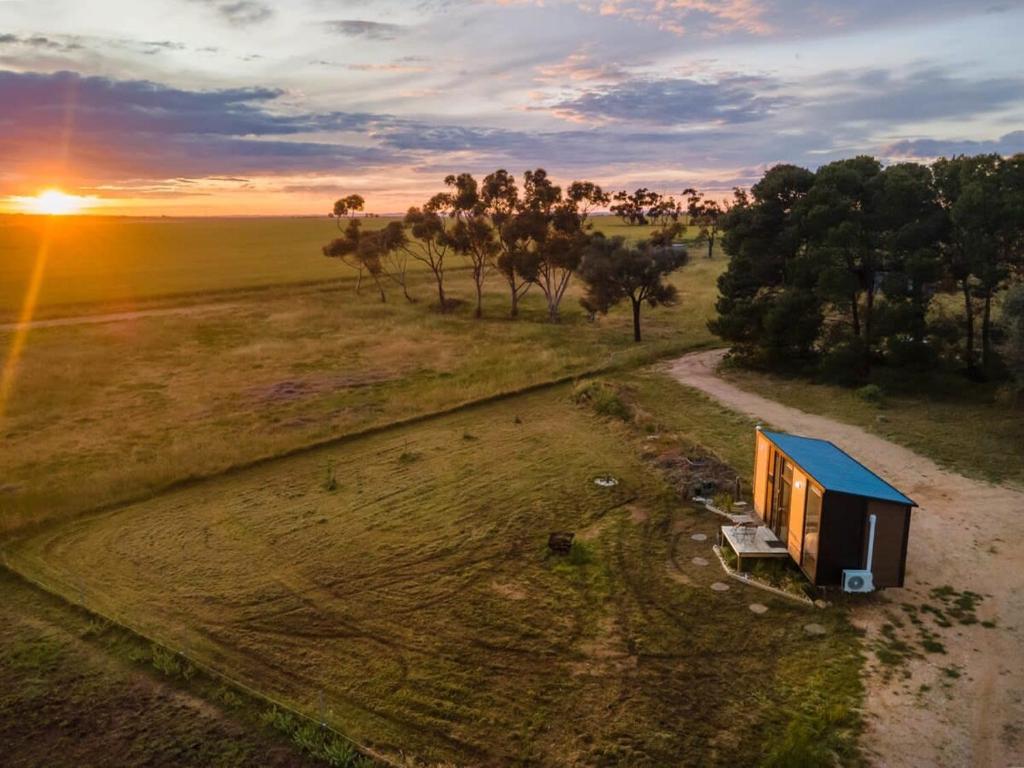 an overhead view of a tiny house in a field at Avondale Heights 