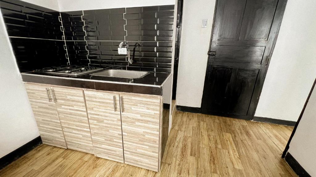 Kuchyň nebo kuchyňský kout v ubytování Apartamentos FM Loft 303