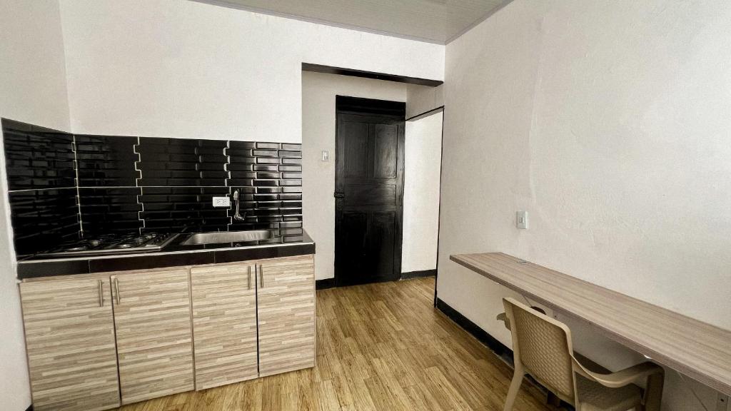Kuchyň nebo kuchyňský kout v ubytování Apartamentos FM Loft 303