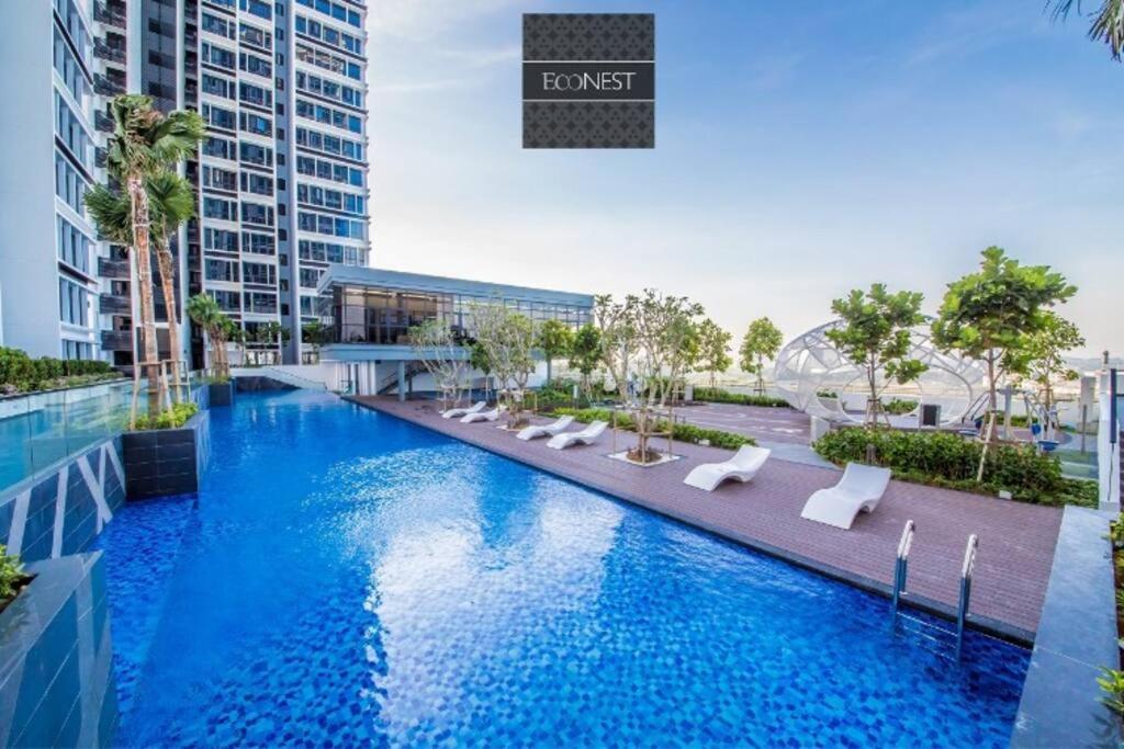 an image of a swimming pool in a building at Lovely Eco Home in Gelang Patah