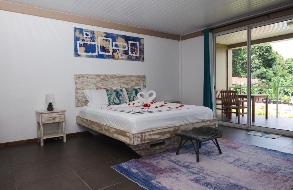 Cama o camas de una habitación en Auguste Holiday Residence