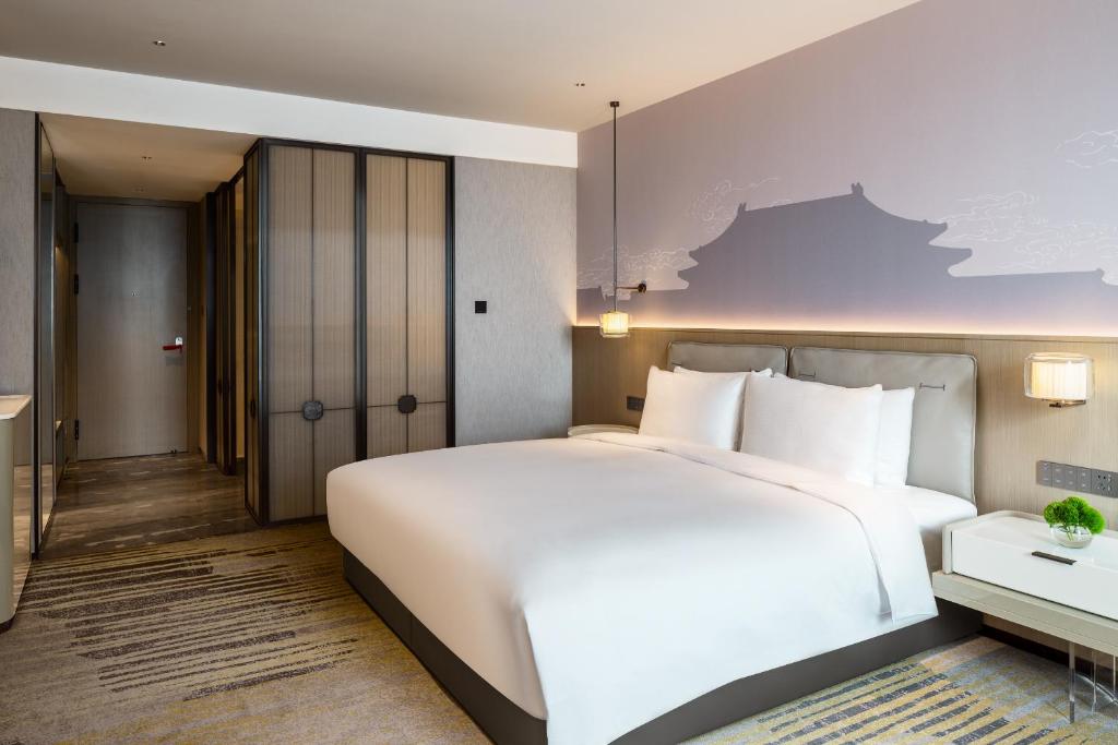 &#x633;&#x631;&#x64A;&#x631; &#x623;&#x648; &#x623;&#x633;&#x631;&#x651;&#x629; &#x641;&#x64A; &#x63A;&#x631;&#x641;&#x629; &#x641;&#x64A; Grand Metropark Yuantong Hotel Beijing