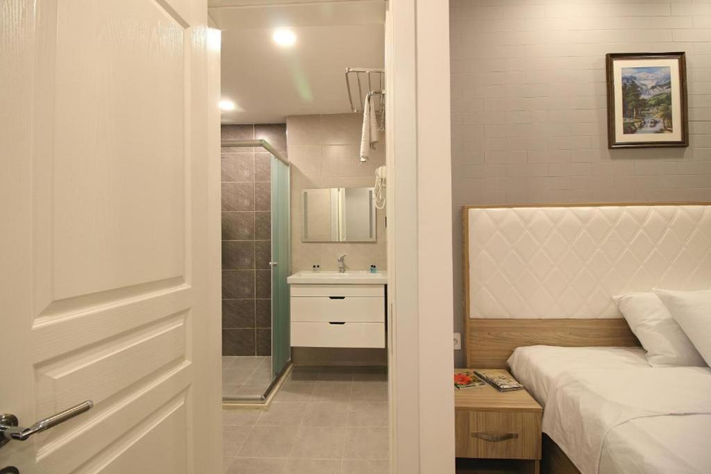 Postel nebo postele na pokoji v ubytování ZamZam-Madina Halal Hotels Group