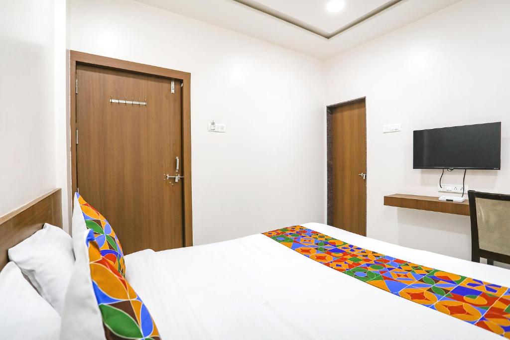 Postel nebo postele na pokoji v ubytování Hotel D Grand