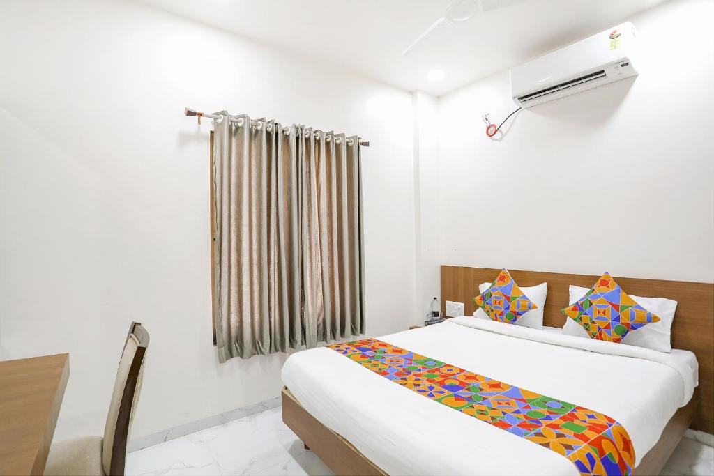 Postel nebo postele na pokoji v ubytování Hotel D Grand
