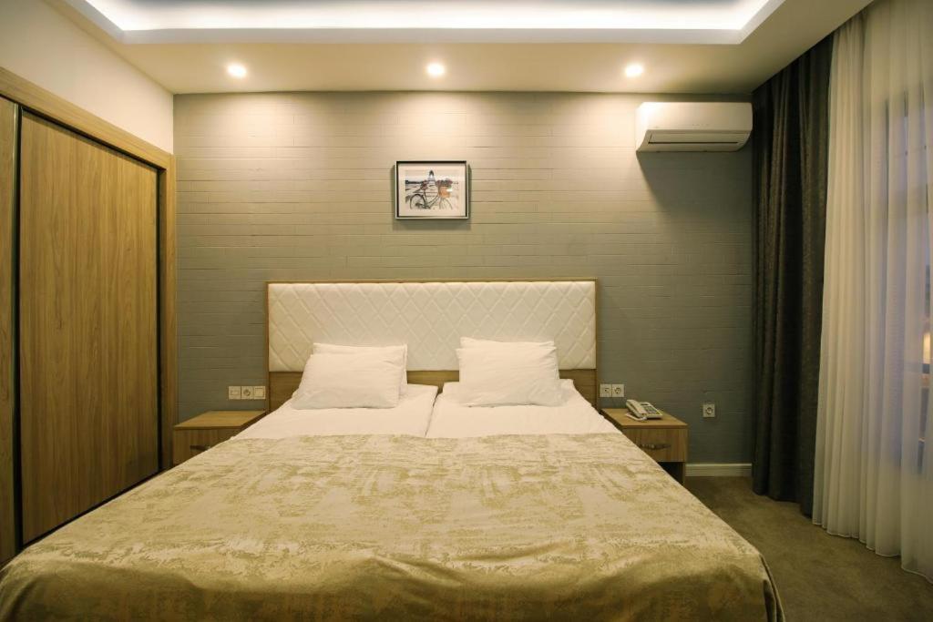 Postel nebo postele na pokoji v ubytování ZamZam-Madina Halal Hotels Group