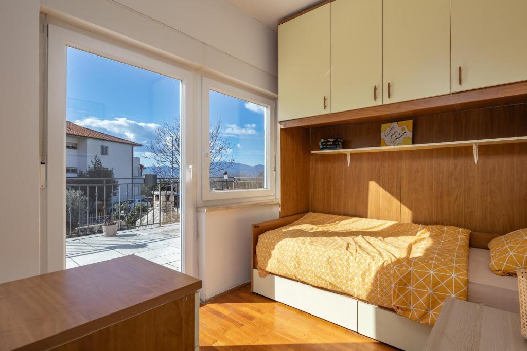 Postel nebo postele na pokoji v ubytování Apartman Lavanda