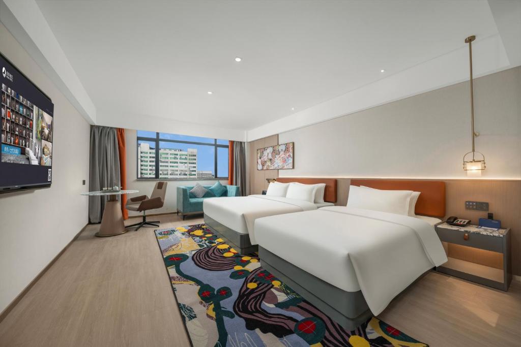 Postel nebo postele na pokoji v ubytování Insail Hotels Guangzhou Beijing Road Pedestrian Branch