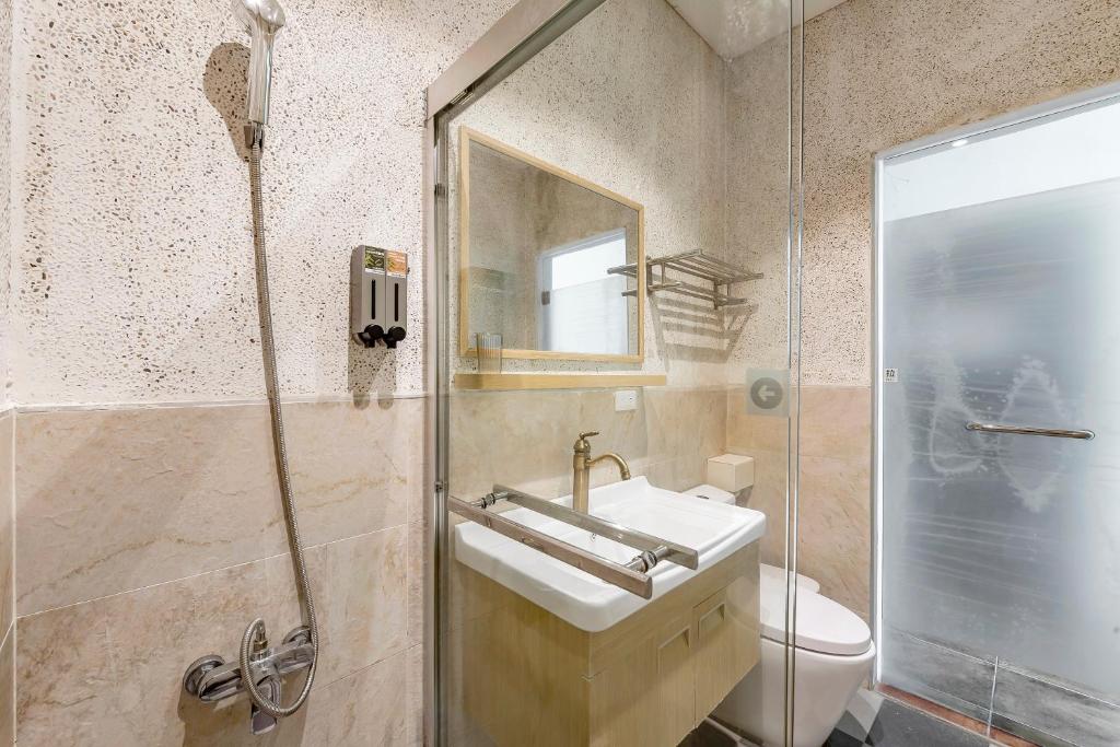 Koupelna v ubytování Kuma B&B