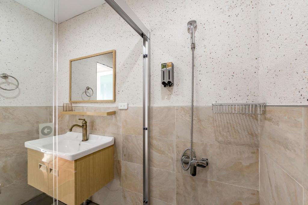 Koupelna v ubytování Kuma B&B