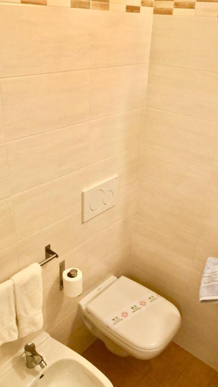 Koupelna v ubytování Hotel Alessi** Rimini