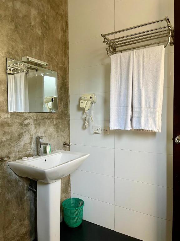 Koupelna v ubytování Olanro Hotel Negombo