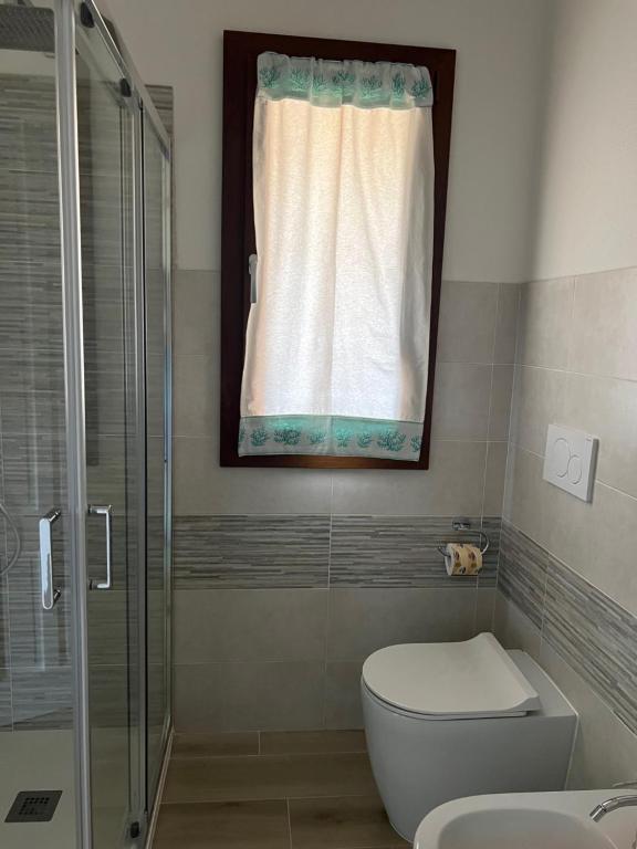 Koupelna v ubytování CASA FANNI- rooms