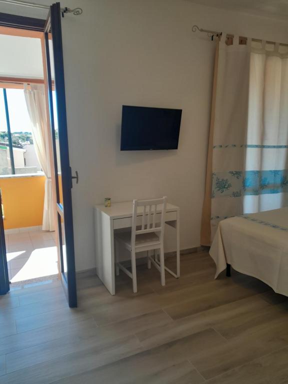 TV a/nebo společenská místnost v ubytování CASA FANNI- rooms