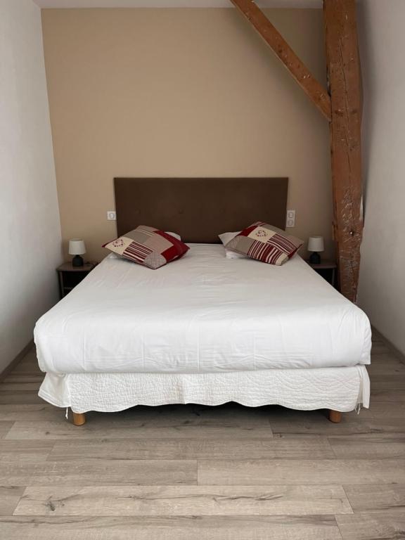 Postel nebo postele na pokoji v ubytování Chambres d'Hotes Noir Lion