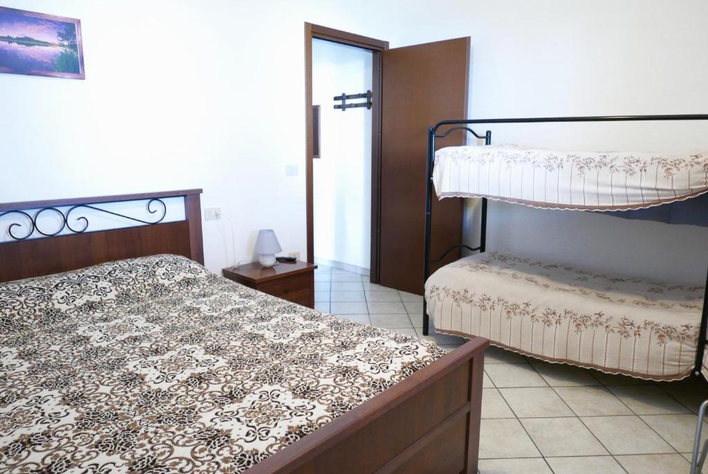 Posteľ alebo postele v izbe v ubytovaní B&B Severini