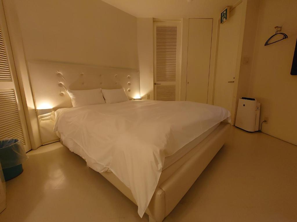 Postel nebo postele na pokoji v ubytování Hotel Forest