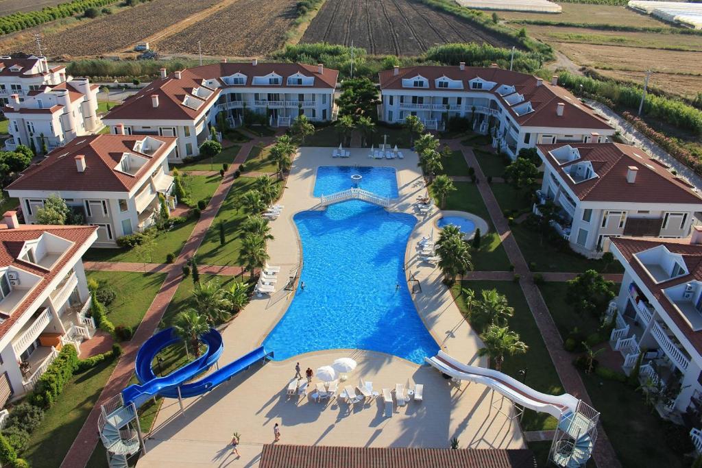an aerial view of a resort with a swimming pool at BlueHomes Villas in Belek