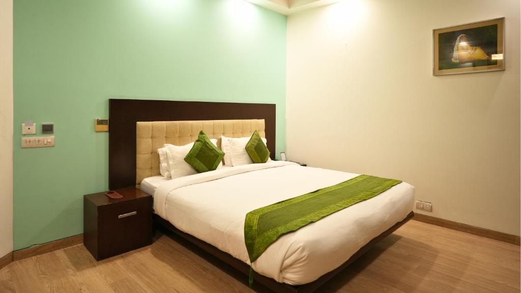 Postel nebo postele na pokoji v ubytování Amber Inn by Orion Hotels