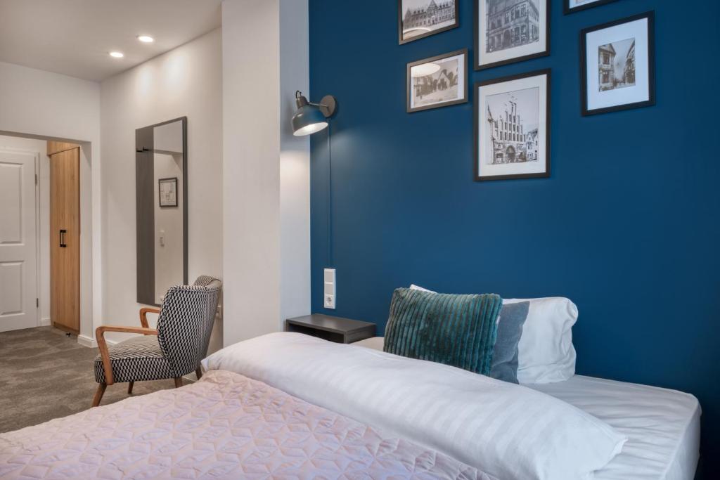 Postel nebo postele na pokoji v ubytování Hotel Bad Minden