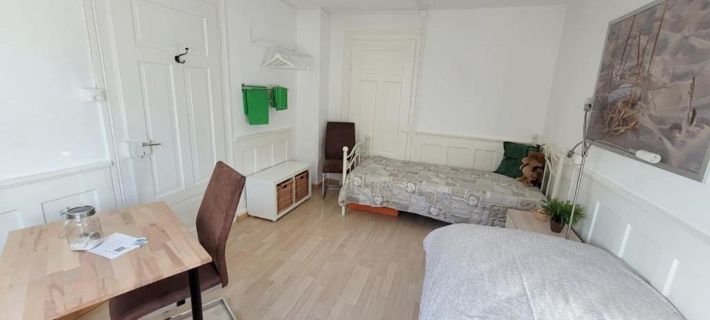 Postel nebo postele na pokoji v ubytování 2 Zimmer Zentral-ruhig mit Flair Gertrud Schlössli