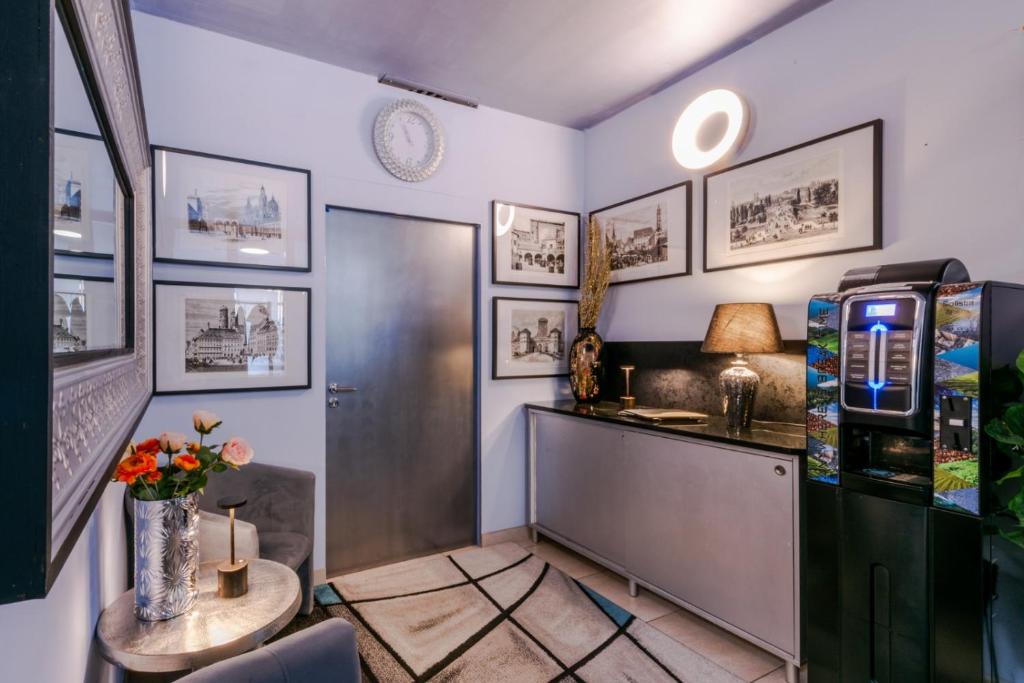 Kuchyň nebo kuchyňský kout v ubytování Hotel Rivoli Charme