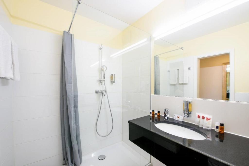 Koupelna v ubytování Hotel Rivoli Charme