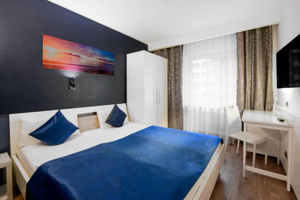 Postel nebo postele na pokoji v ubytování Hotel Rivoli Charme