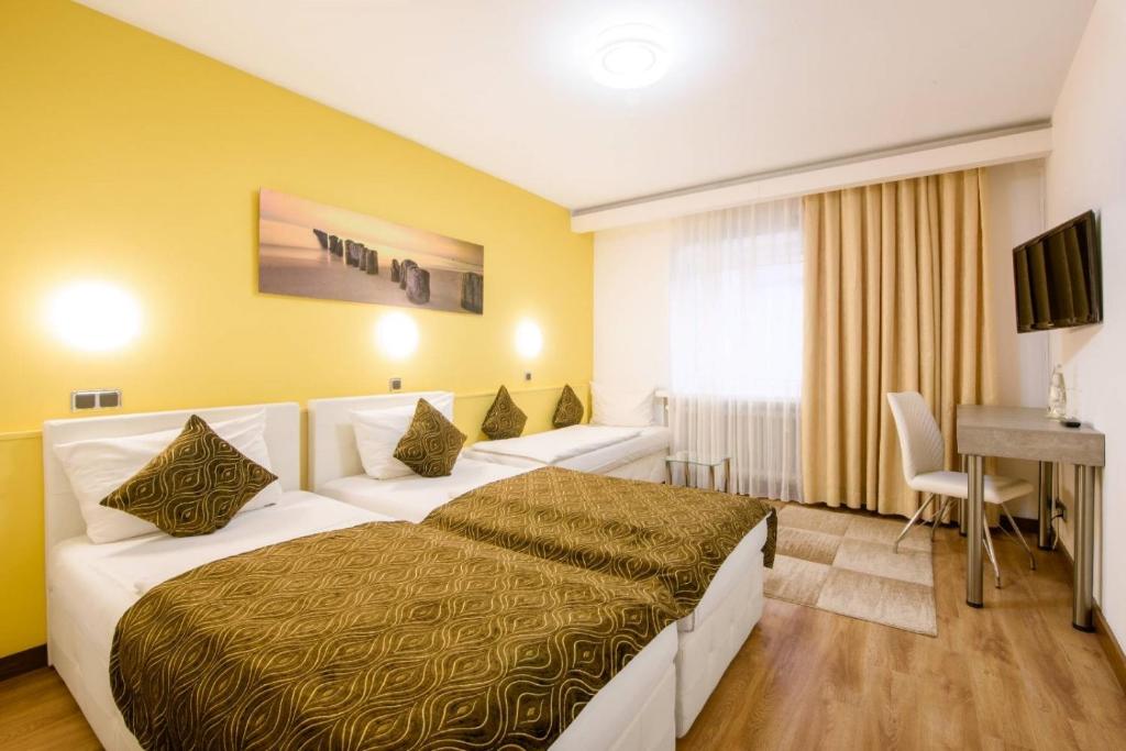 Postel nebo postele na pokoji v ubytování Hotel Rivoli Charme