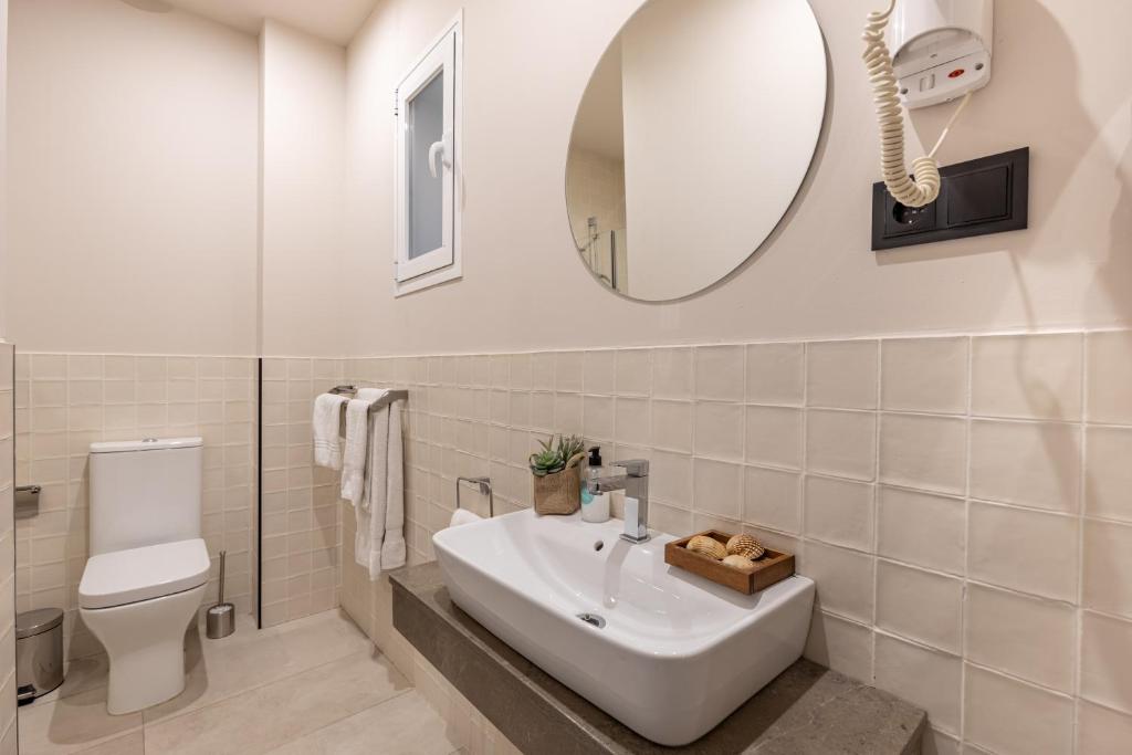 Kúpeľňa v ubytovaní Apartamentos Líbere Málaga Teatro Romano