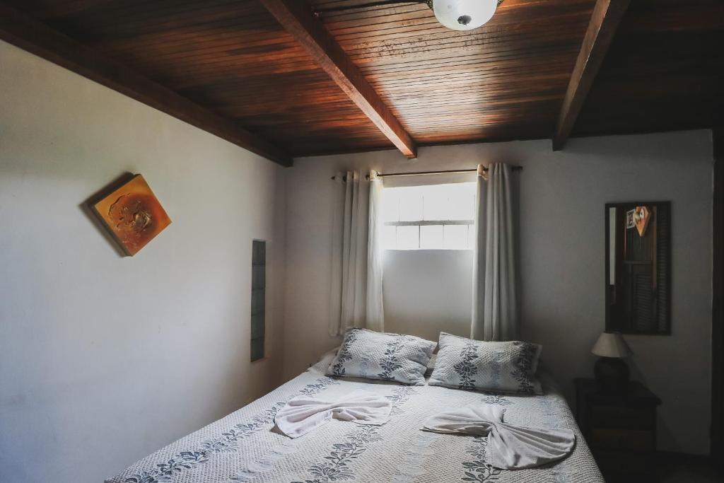 Cama ou camas em um quarto em Hostel Cabo Frio