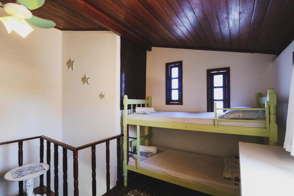 Cama ou camas em um quarto em Hostel Cabo Frio
