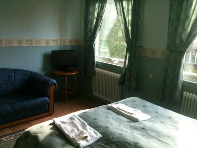 Postel nebo postele na pokoji v ubytování Målilla Hotell & Restaurang