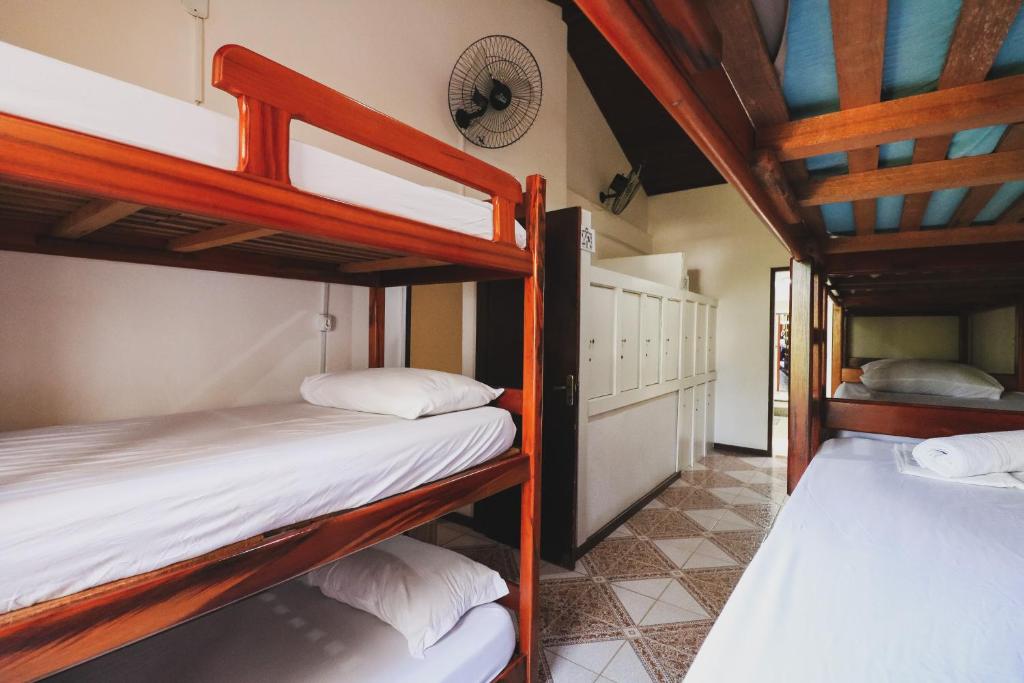 Cama ou camas em um quarto em Hostel Cabo Frio