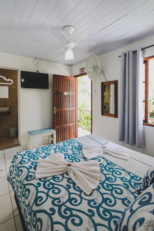 Cama ou camas em um quarto em Hostel Cabo Frio