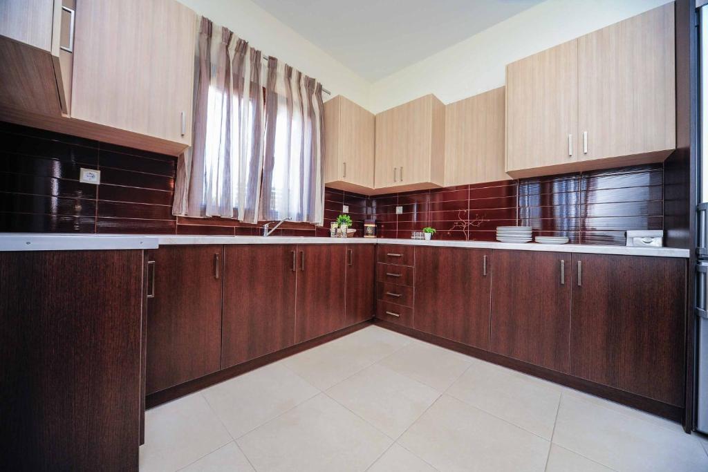 A kitchen or kitchenette at Villa Orsalia