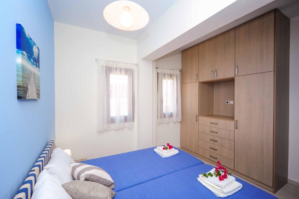 A bed or beds in a room at Villa Orsalia
