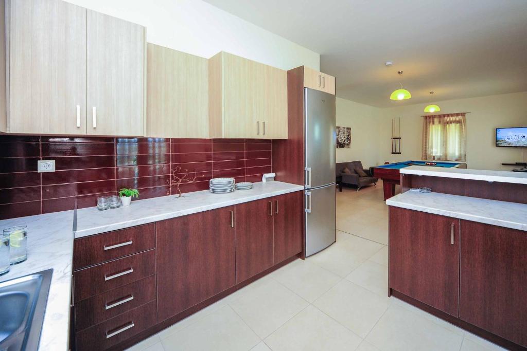 A kitchen or kitchenette at Villa Orsalia